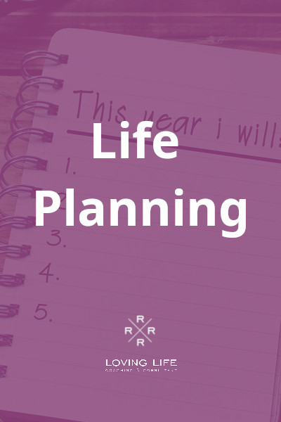 A purple notebook with the words life planning on it.